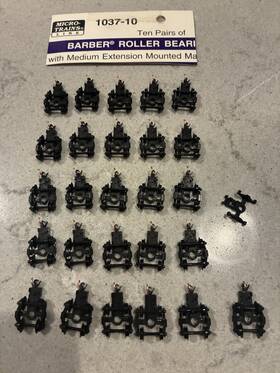 1037-10 Micro-trains 13 Pair Barber Roller Bearing Trucks With Medium Couplers