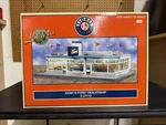 Lionel Scale 6-24113 Hank's Ford Dealership W/lights Figures Brand New In Box. Fixed Price $349.99.
