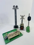 Lionel Postwar 154 Signal Tower 52 Crossing Gate Dock Untested Lot Used. Fixed Price $40.00.