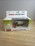 Claas 580 Lexion Combine With Grain Head By Norscot 1/87 Scale. Fixed Price $50.00.
