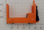 Lionel 356-34 Orange Baggage Cart With Unpainted Figure. Fixed Price $10.00.