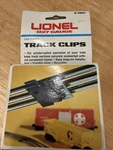 Vintage Lionel 6-2901 O27 Gauge Track Clips Dozen Brand New Box. Fixed Price $20.00.