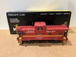 K-line K613-1651 Lehigh Valley Railroad Extended Vision Smoking Caboose. Fixed Price $79.95.