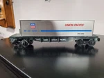 Lionel Union Pacific Flatcar W/ Container Ex. (universal). Fixed Price $19.99.
