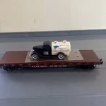 Lionel Train 6-17529 Atsf Flatcar 90010 With 1936 Ford Milk Truck New No Box. Fixed Price $33.33.