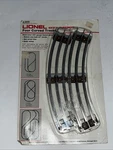 Lionel O27 Four Curved Train Tracks 6-5012 Sealed Minor Damaged Packaging. Fixed Price $18.00.