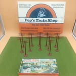 Vintage Plasticville Usa - O/O27S Ga. "telephone Poles" Set Of (12) # 1630:100. Fixed Price $18.95.