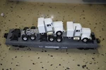 Lionel Flatcar With Corgi Triple Crown Trucks 6-17515. Fixed Price $49.49.
