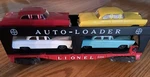 Lionel #6414 Postwar Evans Auto Loader With Original Labeled Cars 55-66. Fixed Price $120.00.
