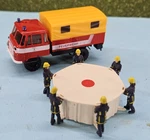 Viking Ho Scale Jump Cushion W/ Fireman Figures And Busch Robur Lo Truck. Fixed Price $22.99.