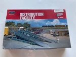 Distribution Facility W/auto Trailer Ho Scale Kit Walthers 933-3076 New. Fixed Price $95.00.