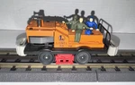 Lionel Gauge Operating 50 Gang Car With Gray Bumpers & Rotating Blue Figure. Fixed Price $55.00.