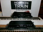 Hte Lionel Postwar Two #3469 Lines Automatic Coal Dump Car. Fixed Price $75.00.