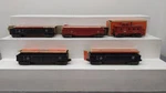 Lionel Vintage Assorted Train Cars 3-6462 Blk, 1-6462 Red & 6357 /box. Fixed Price $48.99.