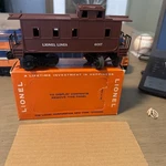 Lionel Caboose Unrun Condition With Perf 6017-1) Mint Box. Fixed Price $100.00.