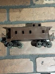 Scarce Lionel Gauge Dark Brown / Olive Drab Unmarked Caboose. Fixed Price $99.99.