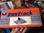 Lionel 6-12059 Gauge Fastrack Earthen Bumper. Fixed Price $24.95.