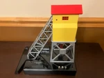 Lionel No. 97 Electric Coal Elevator (mint Condition, Rust, Paint Chips). Fixed Price $140.00.