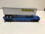 Lionel 6-16923 Flatcar With J. B. Hunt Trailer. Fixed Price $26.95.