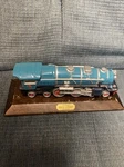 Avon No. 400E 1931 Blue Comet Train Locomotive By Lionel Bild Wood Base. Fixed Price $18.00.