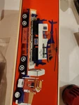 Lionel TMT-18418 Flatbed Toy Truck And Operating Helicopter Car. Fixed Price $74.99.