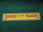 Lionel Electric Trains Porcelain Metal Railroad Sign By Andy Rooney. Fixed Price $30.00.