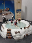 Lemax 54301 Lighted & Animated Table Top High Meadow Skating Pond Box Christmas. Fixed Price $31.50.