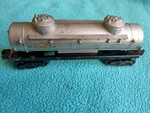 Postwar Lionel Lines 6465 Sunoco Two Dome Silver Tank Car. Fixed Price $19.99.