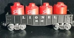 Postwar Lionel Gauge 6112 Short Black Gondola With 4 Red Canisters. Our XS85. Fixed Price $25.00.