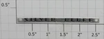 Lionel 2534-14 Silver Bluff Nameplate With Holes (12). Fixed Price $16.80.