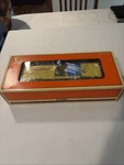 Lionel 6-26206 Curious George Boxcar New-in-box. Fixed Price $24.99.