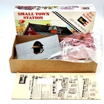 Revell 985 Ho Scale Small Town Station Train Kit 1976 Cigarette Machine Read. Fixed Price $19.50.