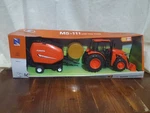 New Ray 1/18 Plastic Kubota M5-111 Tractor With Hay Baler & Sounds SS-33033. Fixed Price $62.50.