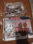 Lionel 6-2181 Set Of 10 Ten Telephone Poles W/ Box Stands Unassembled. Fixed Price $8.79.