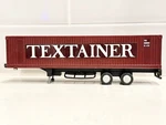 Textainer Ho Scale Container Trailer 1:87 Plastic Brown White Black TEXU9600001. Fixed Price $12.50.
