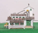 Woodland Scenics Scale Built Ready H&h Feed Mill Lighted BR4949. Fixed Price $78.00.