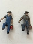 2 American Flyer #35 Brakeman With Lantern. Fixed Price $55.00.