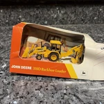 Vintage Ertl John Deere 1/64 Scale Diecast - 310D Backhoe Loader #5521 1993. Fixed Price $21.99.