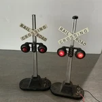 Vintage 2 Lionel Gauge #154 Railroad Crossing Signal Lights (pair). Fixed Price $25.00.