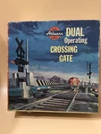 Athearn 3185-2:49 Dual Operating Crossing Gate Trains Miniature As Is. Fixed Price $15.00.