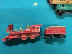 Vtg Lionel Engine 8005 Atsf & Tender Red Out Of Jessie James Set. Fixed Price $136.00.