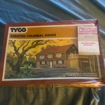 Tyco Lighted Colonial House 945 Scale **sealed New In Box**. Fixed Price $100.00.