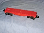 #833 Lionel Post-war 48 Foot Red Flatcar Atsf 9022 Gauge. Fixed Price $15.00.