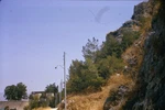 C1960'S Kodachrome 35MM Slide Rocky Hillside Road Utility Poles Trees Wall Roof. Fixed Price $9.99.