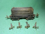 Lionel Prewar 4) Latch Couplers & Lumber Car. Fixed Price $22.00.