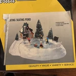 K-line K42423 Operating Skating Pond. Includes The Chalet Three Figures. Fixed Price $80.00.