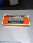 Lionel Sooline Flatcar With Dump Bin #16928. Fixed Price $12.00.