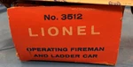 Lionel 3512 Fireman And Ladder Car. Fixed Price $400.00.