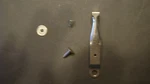 Lionel 671-184 Drawbar, 671-81 Truck Stud, 671-33 Cup Washer & 671-151 Spring. Fixed Price $13.95.