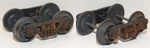 2-WEAVER 3 Rail Plastic Roller Bearing, Spring Loaded Trucks, Weathered W/chalk. Fixed Price $22.00.